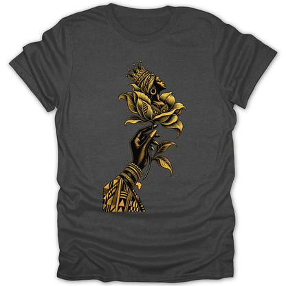 Black hand holding a golden flower with a crowned woman's profile and Africa charm.