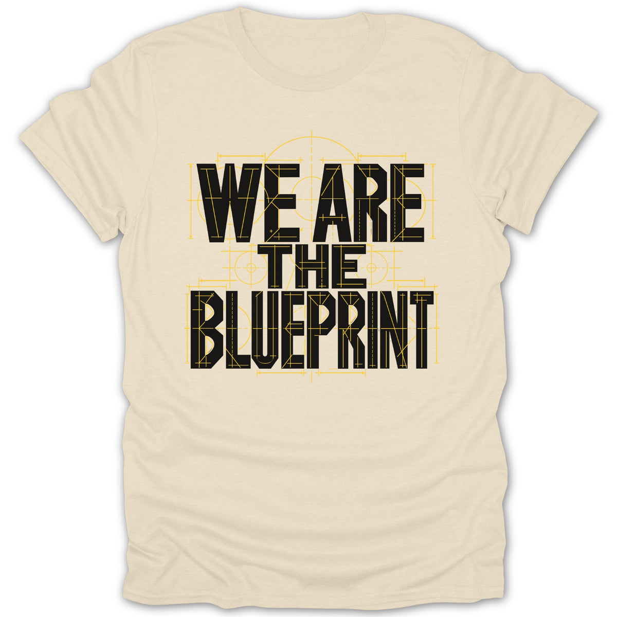 Light beige t-shirt with black text "WE ARE THE BLUEPRINT" in stencil font.