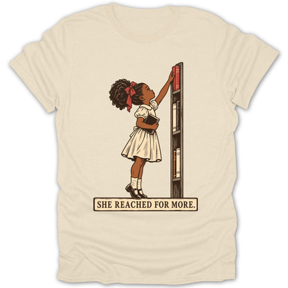Illustration of a girl reaching for a book on a shelf with the text "SHE REACHED FOR MORE."