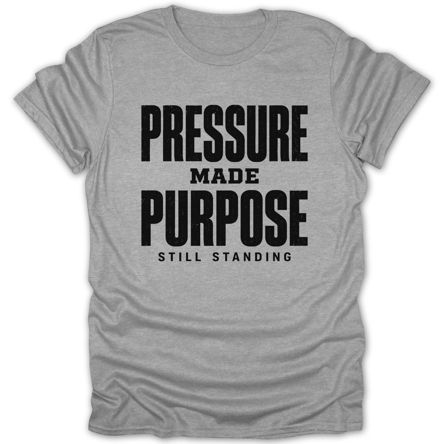 Grey t-shirt with black text reading "PRESSURE MADE PURPOSE STILL STANDING"
