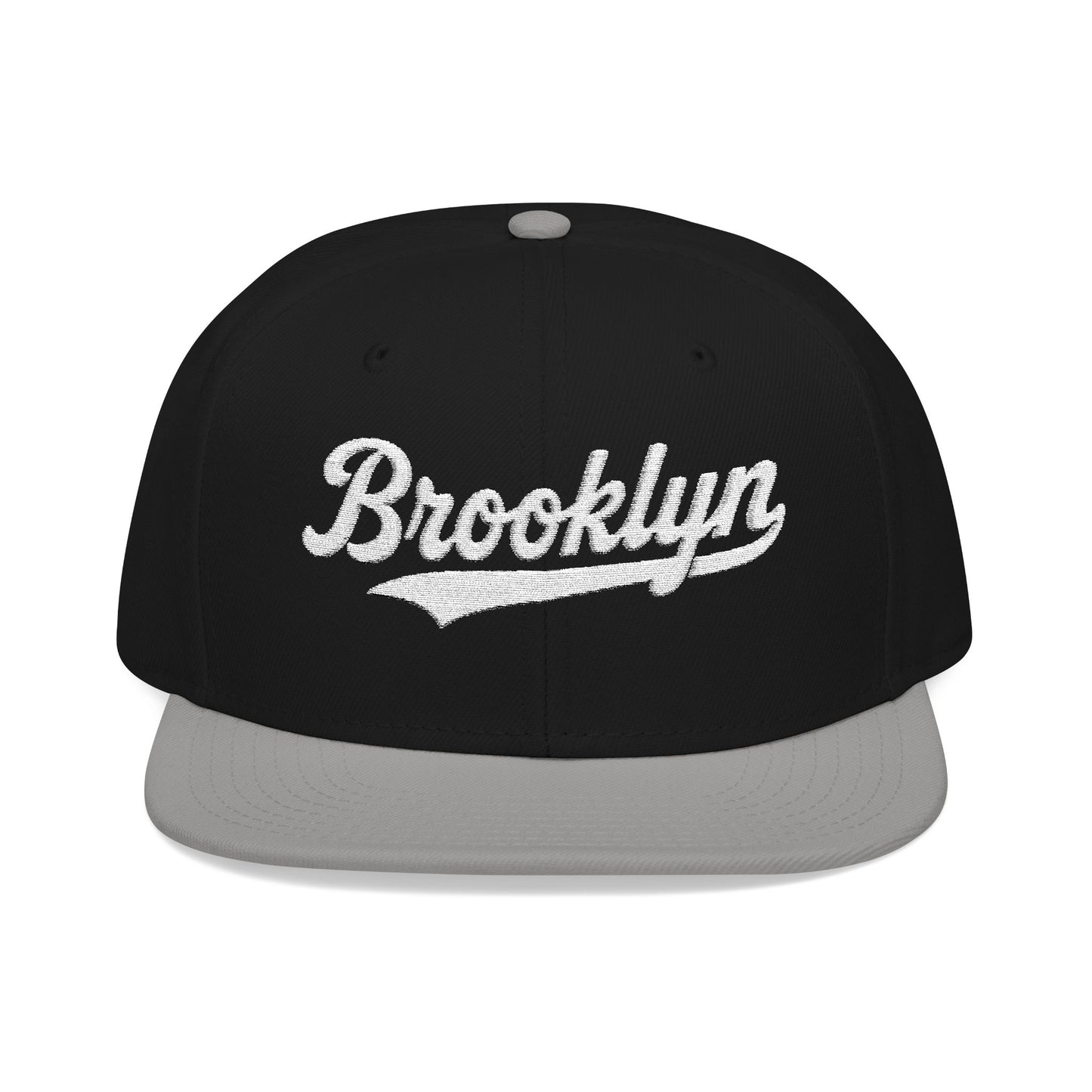 Black flat brim hat with "Brooklyn" embroidered in white script.