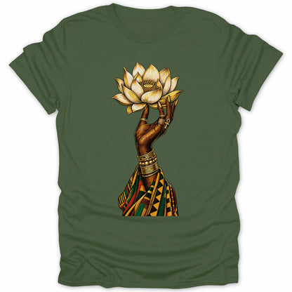 Green t-shirt featuring a dark-skinned hand holding a golden lotus flower with an ankh symbol.