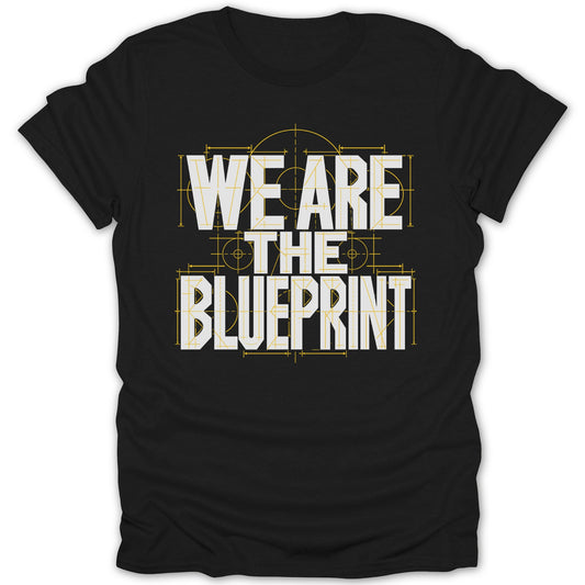 Black t-shirt with white text "WE ARE THE BLUEPRINT" in blueprint style.