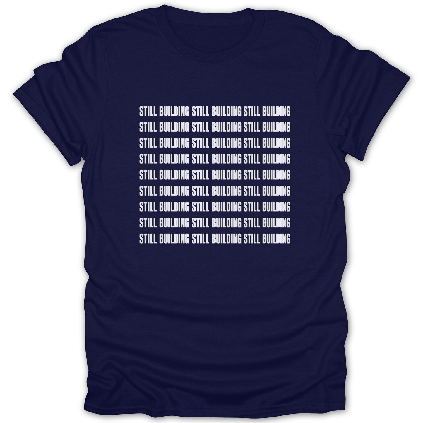 Navy t-shirt with repeating "STILL BUILDING" text in white on the front.