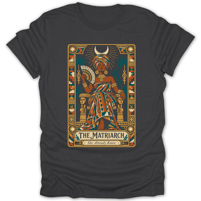 "The Matriarch" text design with a regal woman holding a fan and moon symbol.