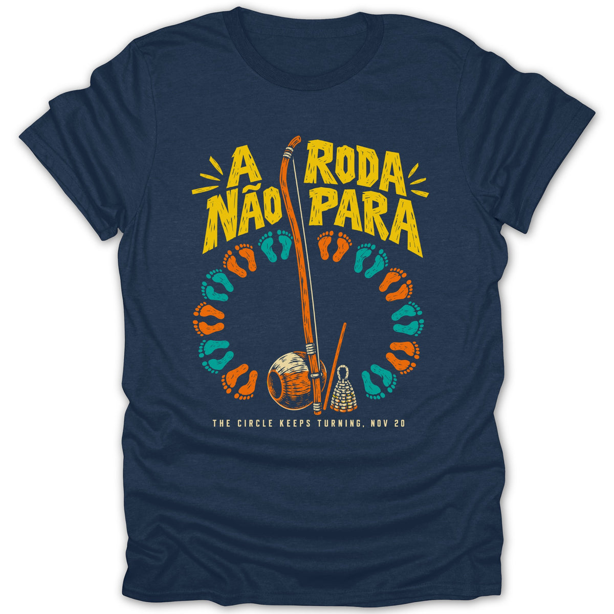 Navy t-shirt with "A Roda Nao Para" and capoeira instruments.