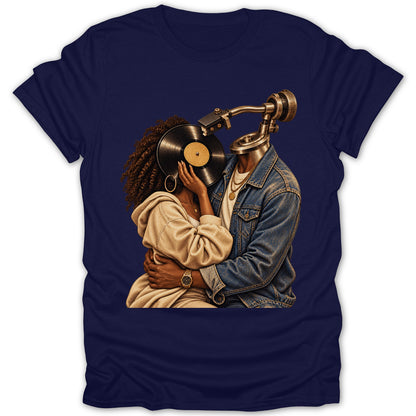 Couple embracing, one with a record player head, on a navy t-shirt.