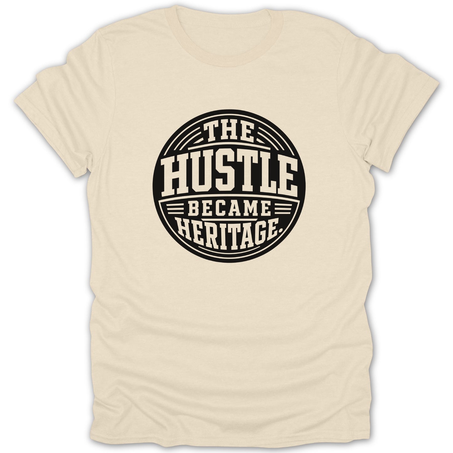 Cream t-shirt with black text that reads "The Hustle Became Heritage" in a circular design.