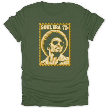 Olive green t-shirt featuring a yellow graphic of a man with an afro and sunglasses, resembling a postage stamp with the text "SOUL ERA 72¢".