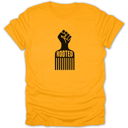 A yellow crewneck t-shirt featuring a black graphic of an afro pick combining with a raised fist and the text ROOTED.