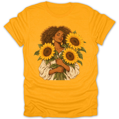 Illustration of woman with afro holding sunflowers on a yellow t-shirt.