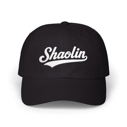 Black baseball cap with white "Shaolin" script embroidery.