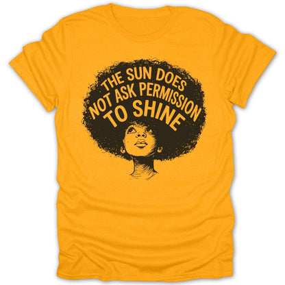 Yellow t-shirt with "The sun does not ask permission to shine" and a woman's portrait.
