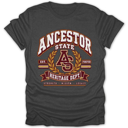 Dark grey t-shirt with "Ancestor State Heritage Dept." graphic featuring laurel leaves and "Strength, Wisdom, Legacy".