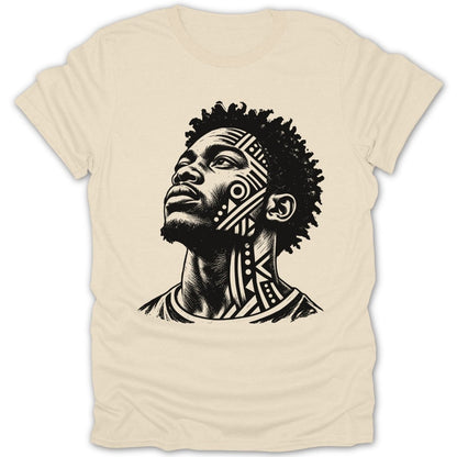 Black and white portrait of a man with tribal face markings on a cream t-shirt.
