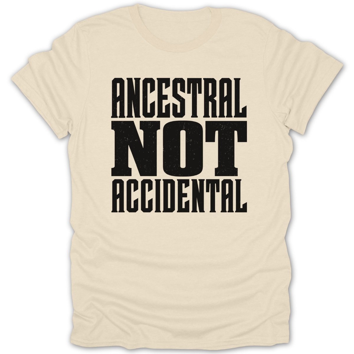 Cream t-shirt with black text reading "ANCESTRAL NOT ACCIDENTAL".