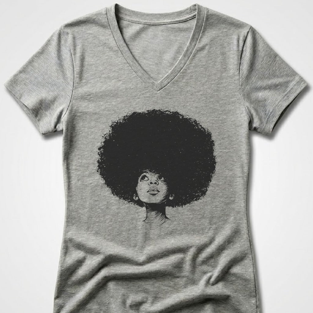 T-shirt graphic of a woman with a large afro looking upwards.