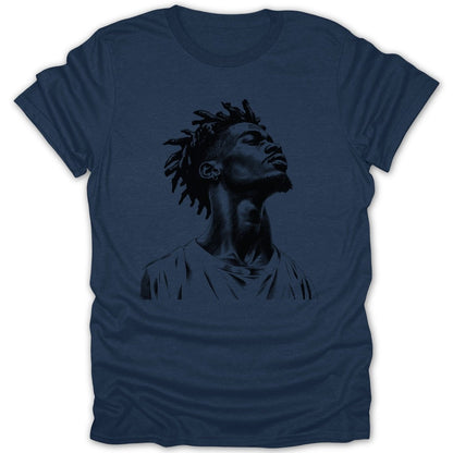 Navy t-shirt with a black ink sketch of a man with dreadlocks looking upwards.
