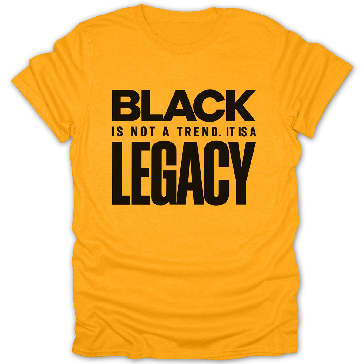 Yellow t-shirt with black text reading "BLACK IS NOT A TREND. IT IS A LEGACY."
