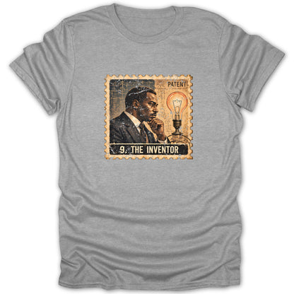 Heather gray t-shirt featuring a postage stamp graphic titled 9. The Inventor with a man and lightbulb.