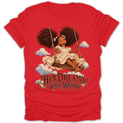 Girl on swing with text "Her Dreams Have Wings" on a red t-shirt.