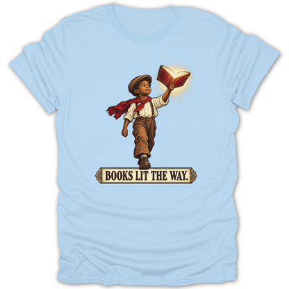 Boy in vintage clothes holds glowing book above head with text "BOOKS LIT THE WAY".