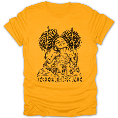 Girl on swing with text "FREE TO BE ME" on an orange t-shirt.