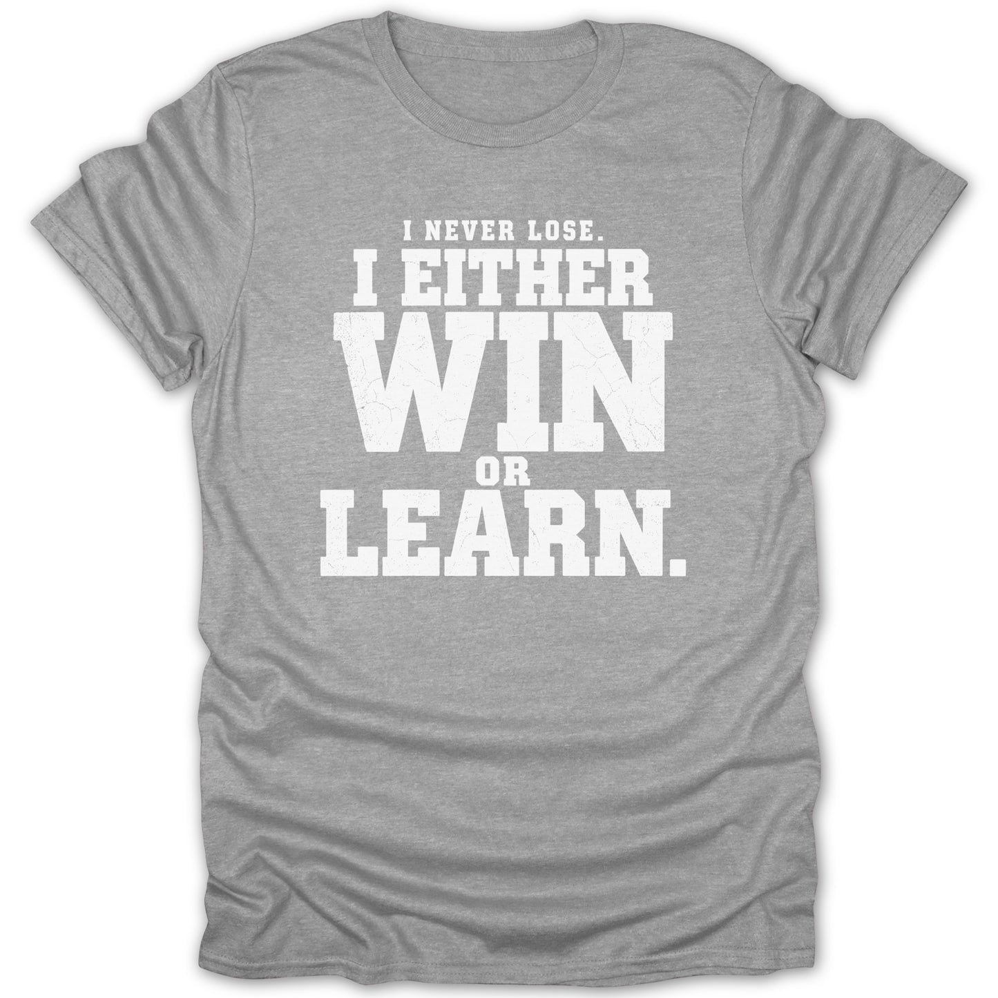 Grey t-shirt with distressed white text reading "I NEVER LOSE. I EITHER WIN OR LEARN."