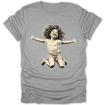 T-shirt with a drawing of a joyful child with curly hair jumping in the air.