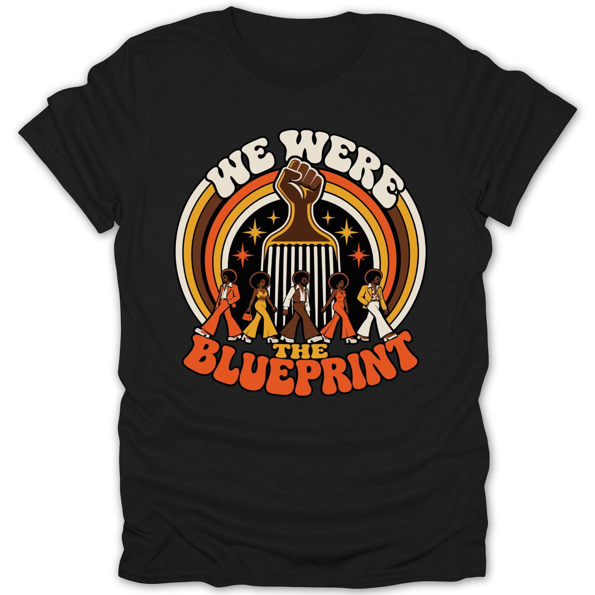 "We Were The Blueprint" text with retro figures and raised fist on black t-shirt.
