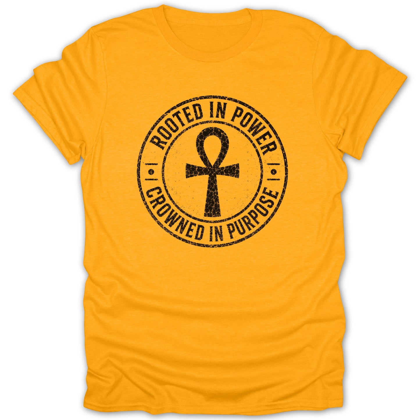 Orange t-shirt with black circular graphic of an ankh and text "Rooted in Power, Crowned in Purpose".