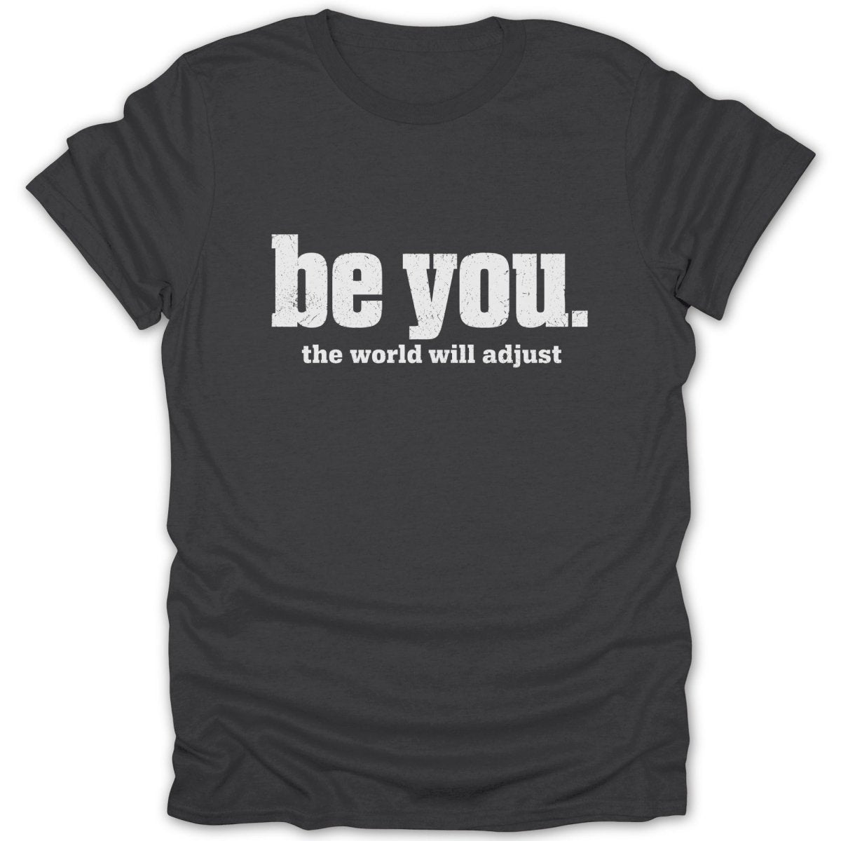 Dark grey t-shirt with "be you. the world will adjust." in white text.