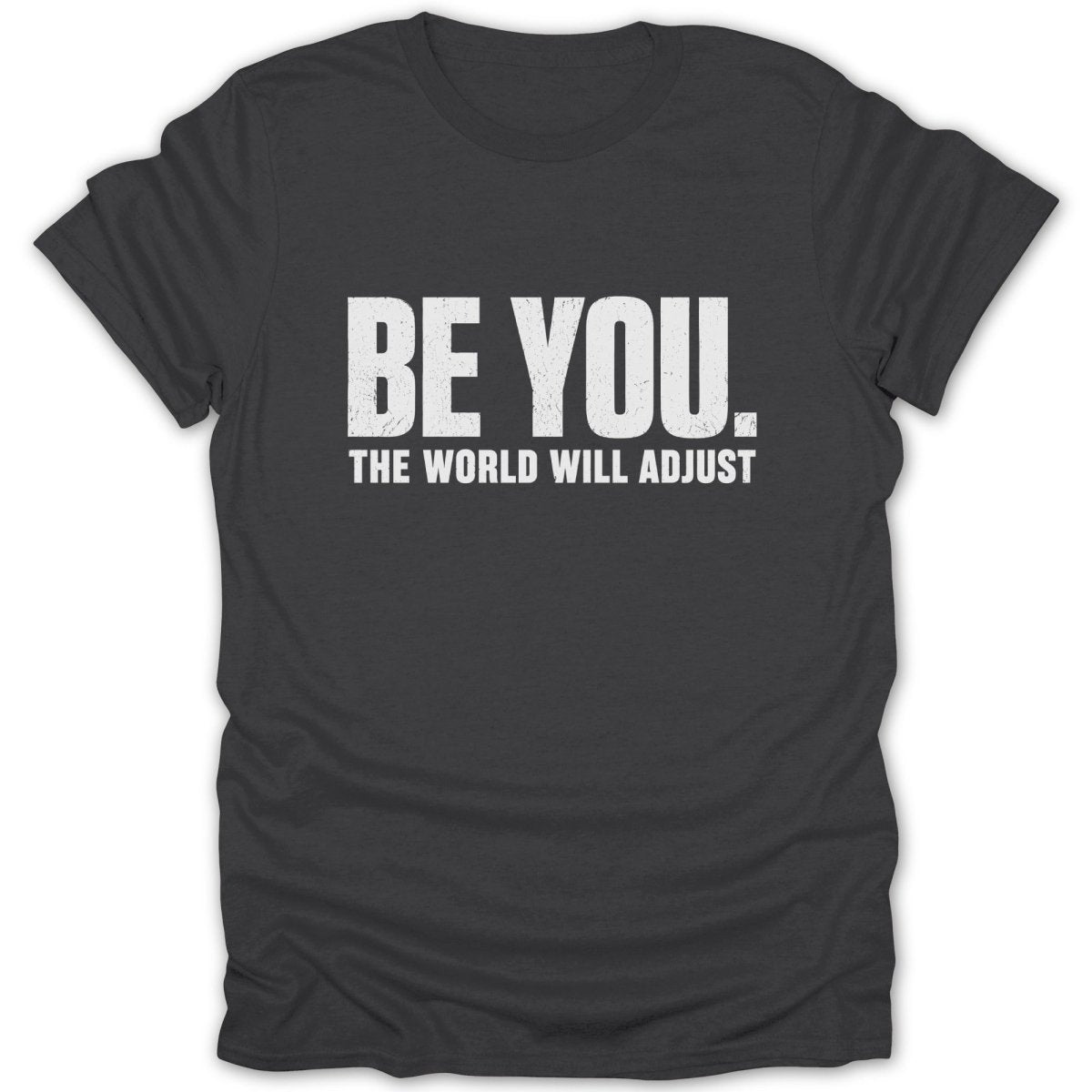 Black t-shirt with white text "BE YOU. THE WORLD WILL ADJUST."