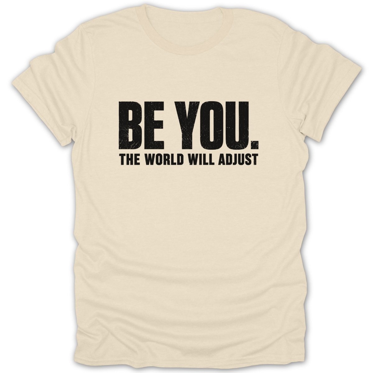 Cream t-shirt with black text "BE YOU. THE WORLD WILL ADJUST."