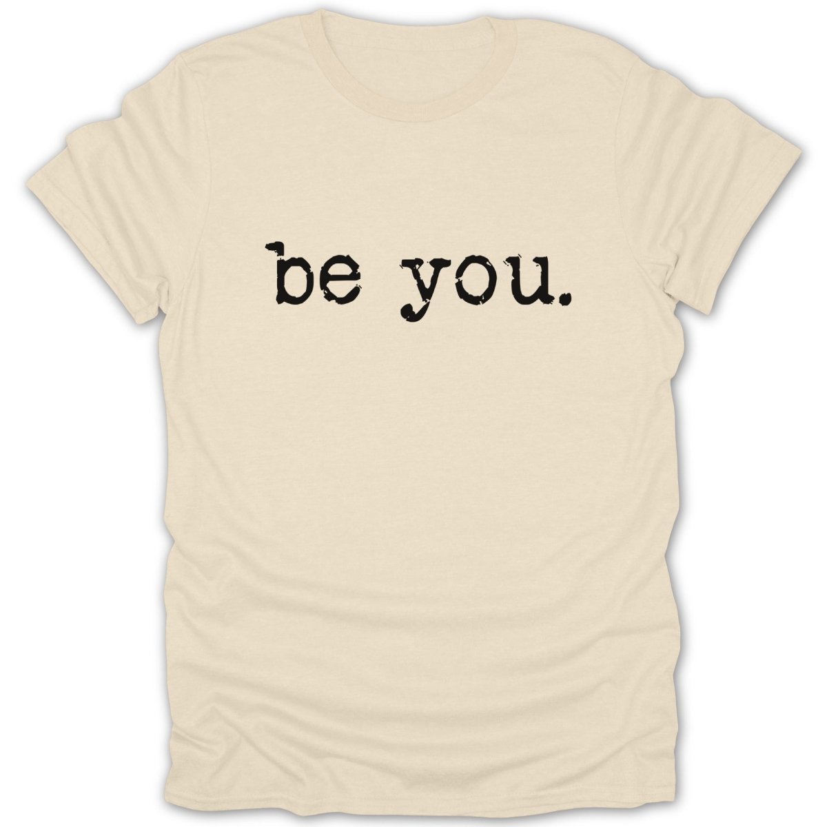 Cream t-shirt with black text reading "be you."