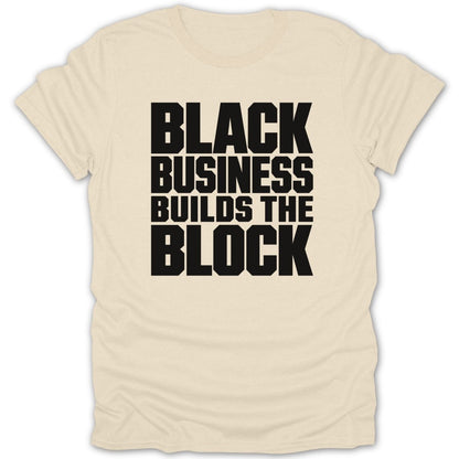 Cream t-shirt with black text that reads "BLACK BUSINESS BUILDS THE BLOCK".