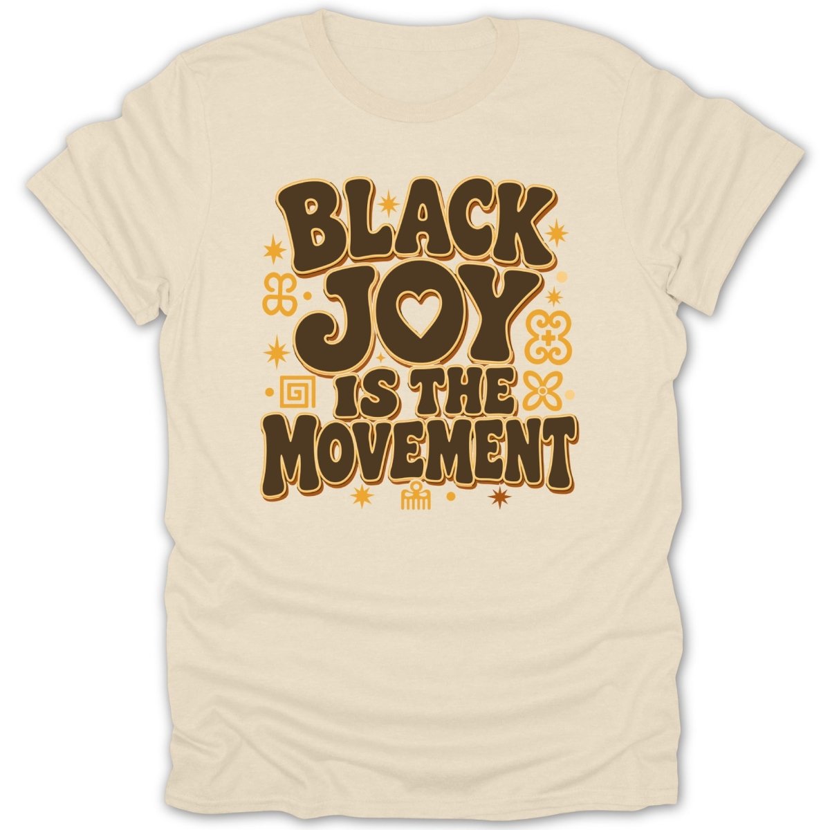 Cream t-shirt with text "BLACK JOY IS THE MOVEMENT" in brown lettering.