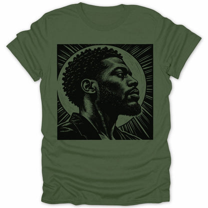 Woodcut-style illustration of a man's profile against a sunburst on a green t-shirt.