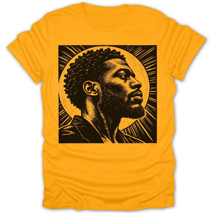 Yellow t-shirt with a black and gold linocut print of a man's profile.