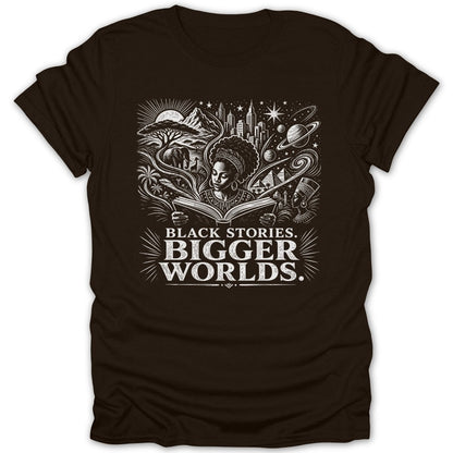 Brown t-shirt with black and white graphic of woman reading and text "BLACK STORIES. BIGGER WORLDS."