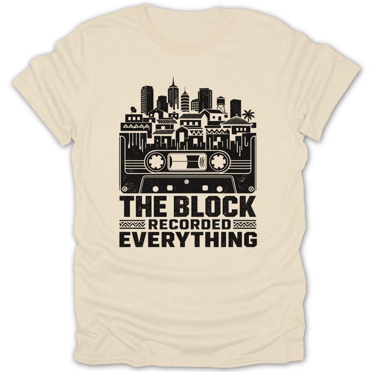 T-shirt with black graphic of cassette tape and cityscape, reading "The Block Recorded Everything."