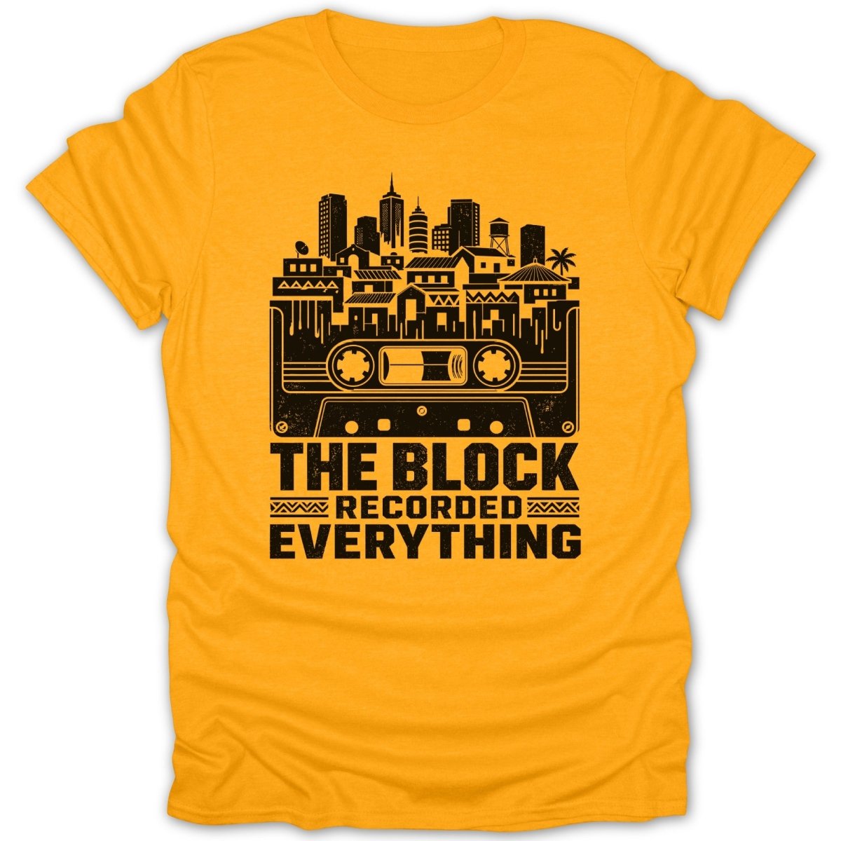 Yellow t-shirt with black graphic of a cassette tape, city skyline, and text.