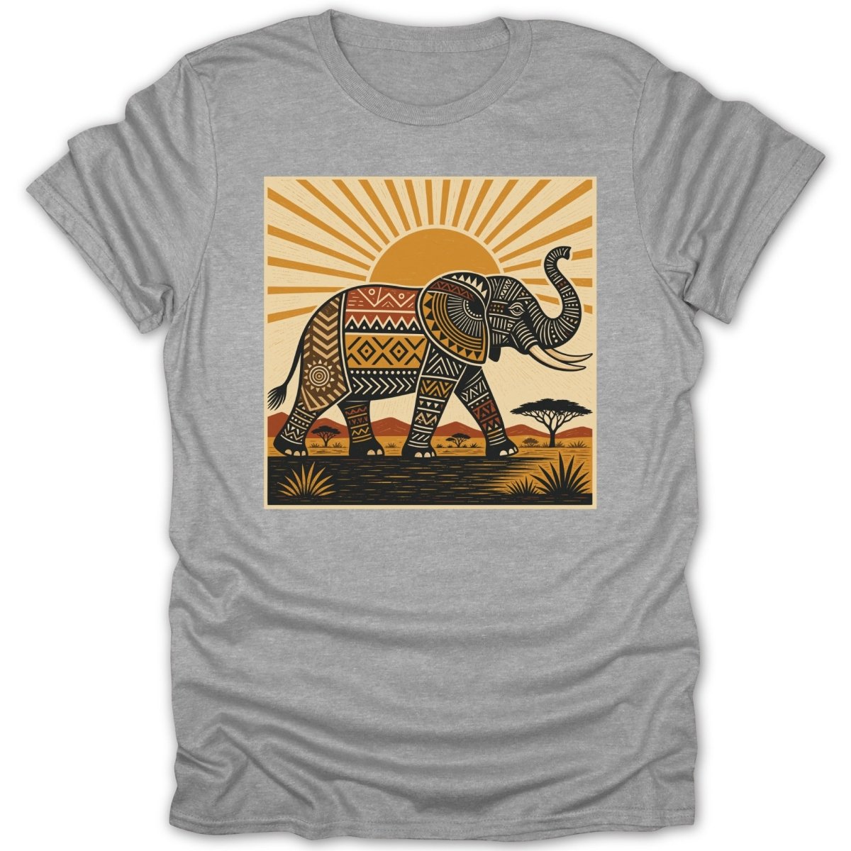 Tribal patterned elephant walking across a savanna during a sunrise on a grey t-shirt.