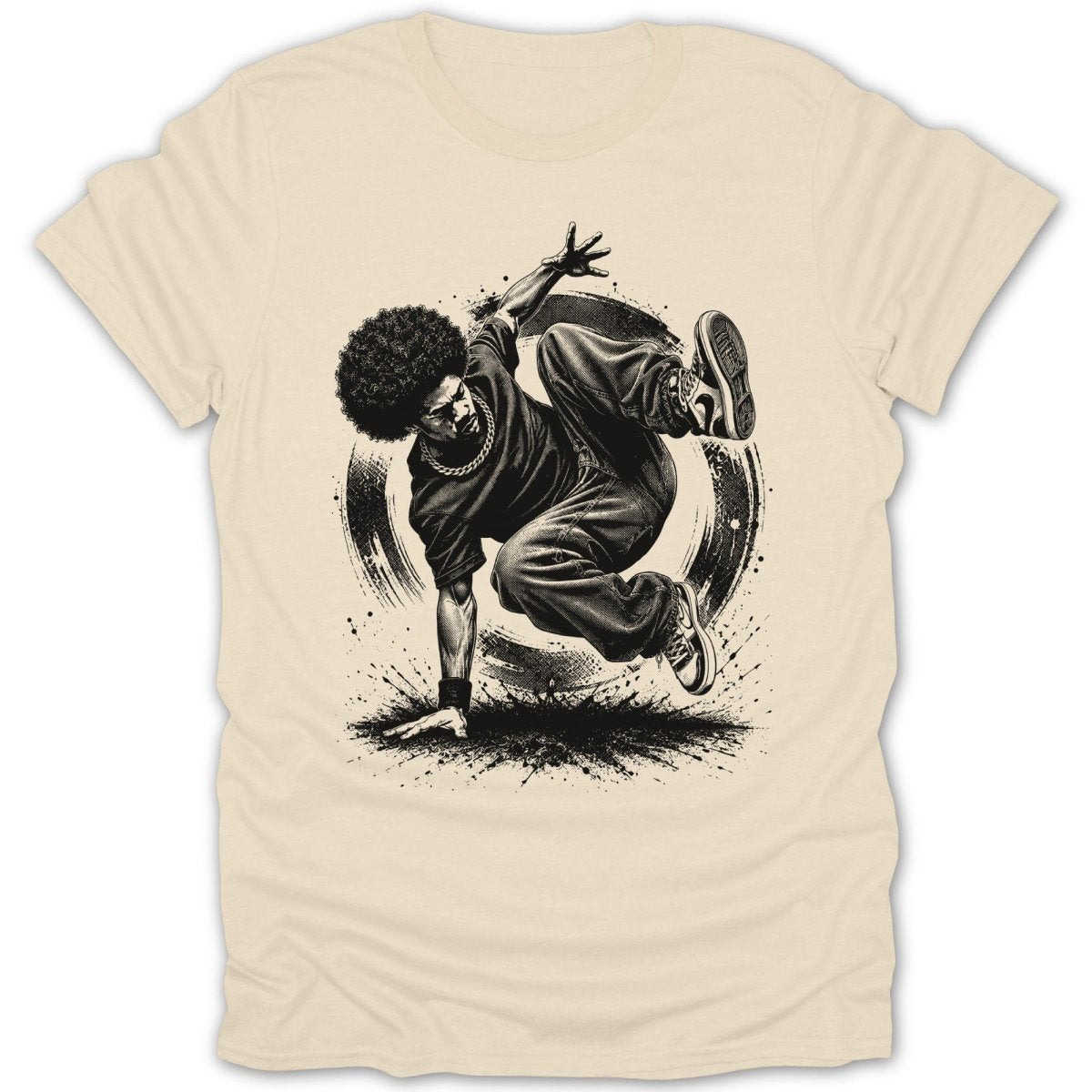 Black and white illustration of a breakdancer with an afro, performing a move on a cream t-shirt.