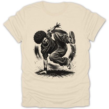 Black and white illustration of a breakdancer with an afro, performing a move on a cream t-shirt.