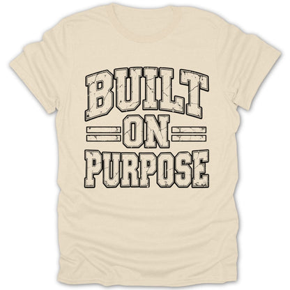 Cream t-shirt with black distressed text "BUILT ON PURPOSE"