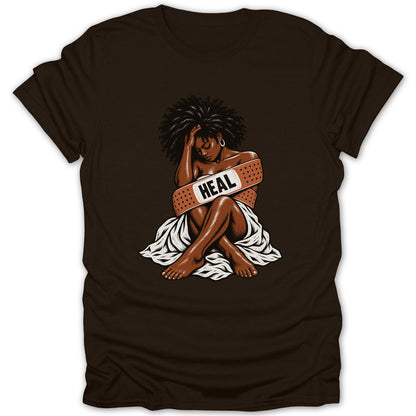 Illustration of a woman with a bandage saying "HEAL" on a brown t-shirt.