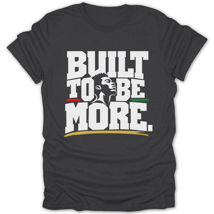 Dark grey t-shirt with "BUILT TO BE MORE" text and a man's profile.