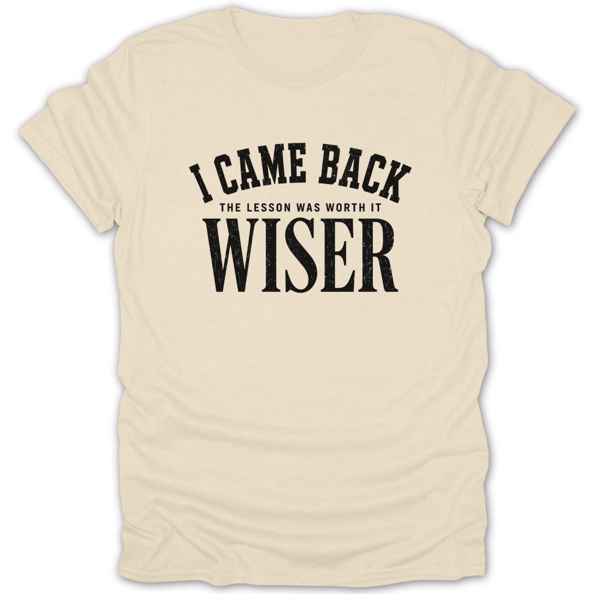 Cream t-shirt with black text: "I CAME BACK THE LESSON WAS WORTH IT WISER"
