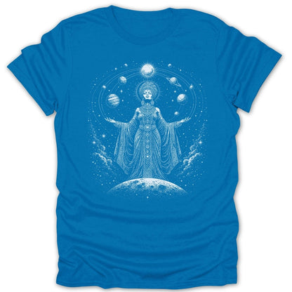 White line art of a crowned figure surrounded by planets and stars on a blue t-shirt.